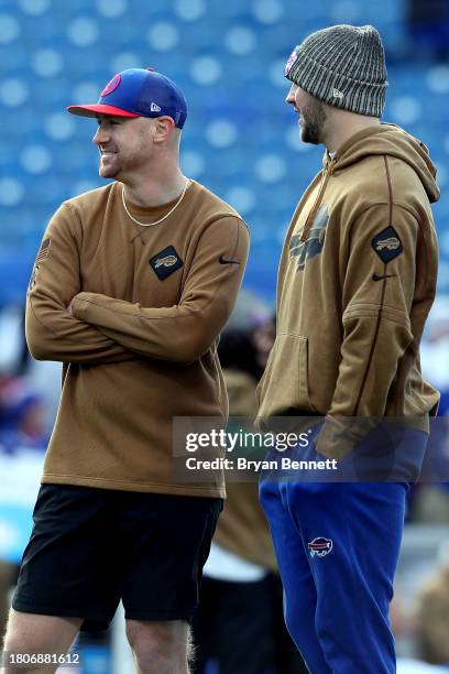 Offensive Coordinator Joe Brady, left, and Josh Allen of the Buffalo Bills prior to a game against the New York Jets at Highmark Stadium on November...