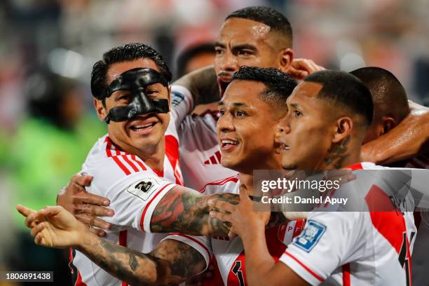 Yosimar Yotun of Peru celebrates with his teammates after scoring the team's first goal during the FIFA World Cup 2026 Qualifier match between Peru...