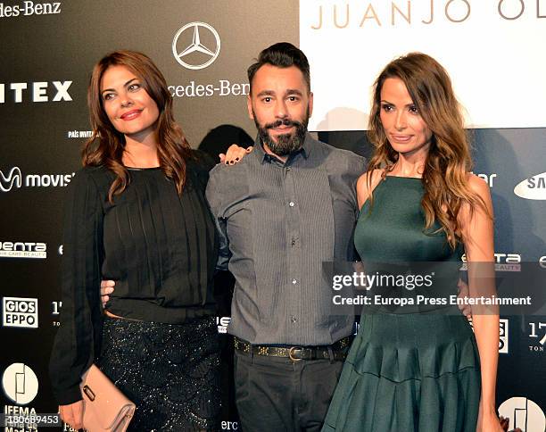 Maria Jose Suarez, Juanjo Oliva and Almudena Fernandez attend a fashion show during the Mercedes Benz Fashion Week Madrid Spring/Summer 2014 on...