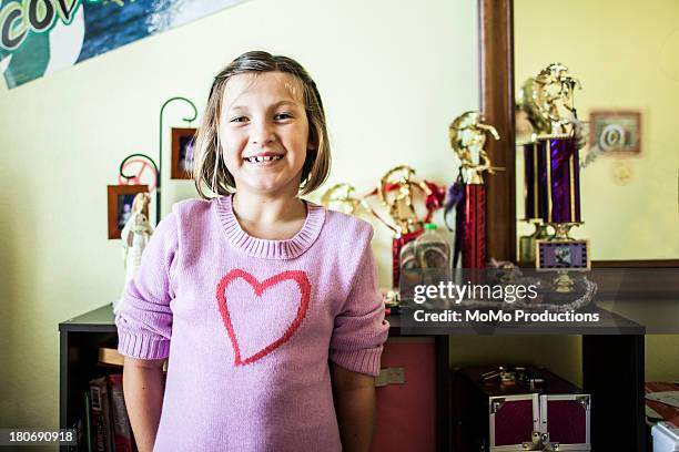 young girl (11) with trophies - title nine imagens e fotografias de stock