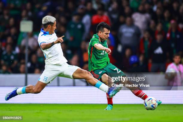 Andy Najar of Honduras battles for the ball against Hirving Lozano of Mexico during the CONCACAF Nations League quarterfinals second leg match...