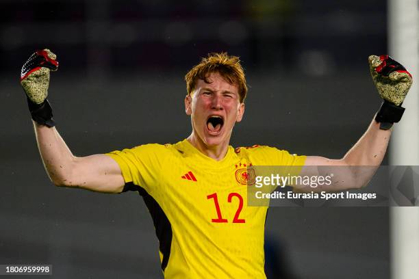 Konstantin Heide of Germany celebrates after stopping a penalty from Argentina during FIFA U-17 World Cup Semi final match between Argentina and...