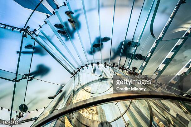 menschen gehen auf transparentem glas-treppe - blaue schuhe stock-fotos und bilder