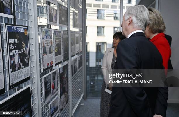 King Philippe - Filip of Belgium and Queen Mathilde of Belgium pictured during a royal visit to the editorial floor of the newspaper Le Soir, in...