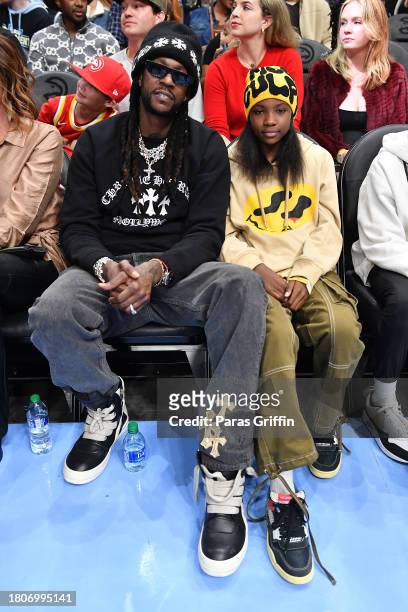 Chainz and Harmony Epps attend the NBA In-Season Tournament game between the Indiana Pacers and the Atlanta Hawks at State Farm Arena on November 21,...