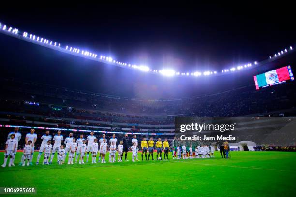 Players of Mexico and Honduras line up prior the CONCACAF Nations League quarterfinals second leg match between Mexico and Honduras at Azteca Stadium...