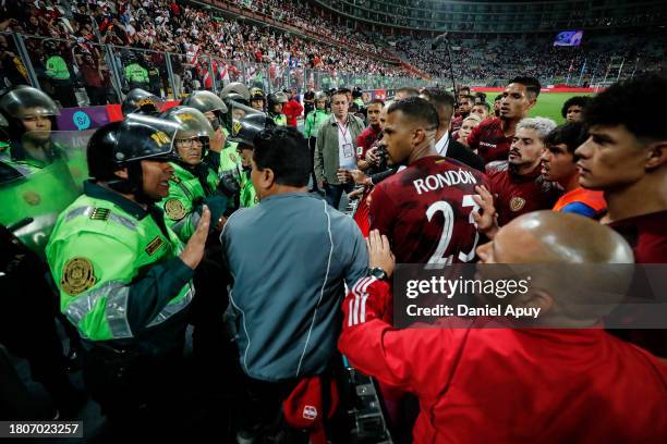 Players of Venezuela argue with the police during the FIFA World Cup 2026 Qualifier match between Peru and Venezuela at Estadio Nacional de Lima on...