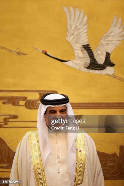 King Hamad Bin Isa Al Khalifa of Bahrain attends a signing ceremony between China and Bahrain at the Great Hall of People on September 16, 2013 in...