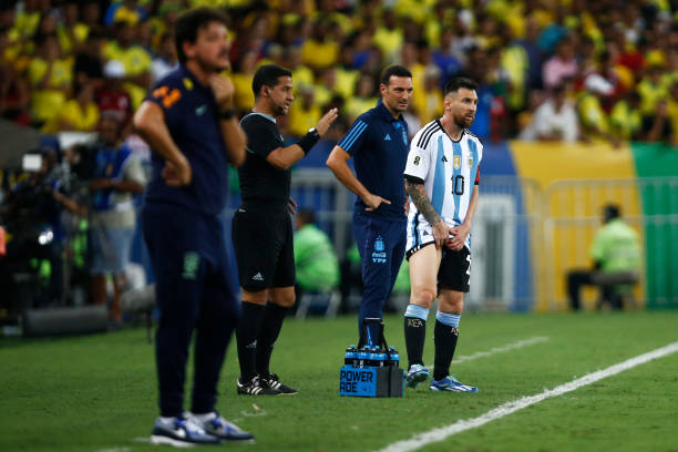 Lionel Messi of Argentina waits to enter the pitch after receiving medical attention during a FIFA World Cup 2026 Qualifier match between Brazil and...