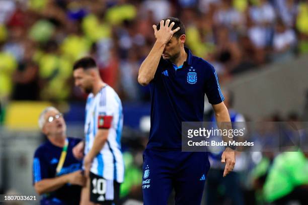 Lionel Scaloni, Head Coach of Argentina, reacts as Lionel Messi of Argentina receives medical attention during a FIFA World Cup 2026 Qualifier match...