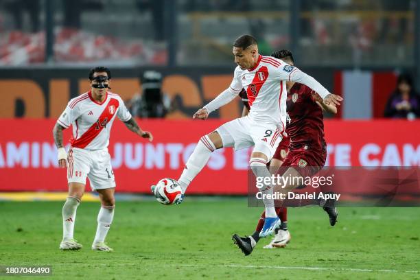 Paolo Guerrero of Peru battles for the ball against Wilker Angel of Venezuela during the FIFA World Cup 2026 Qualifier match between Peru and...