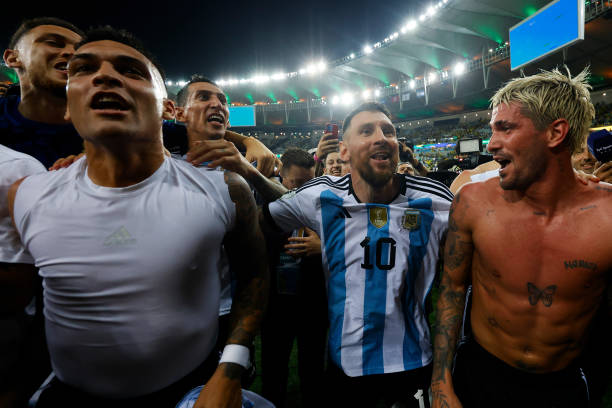 Lionel Messi of Argentina and teammates celebrate with fans after winning a FIFA World Cup 2026 Qualifier match between Brazil and Argentina at...