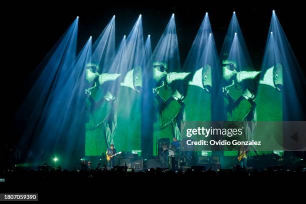 Graham Coxon, Damon Albarn, Dave Rowntree and Alex James perform during a concert at Movistar Arena on November 21, 2023 in Bogota, Colombia.