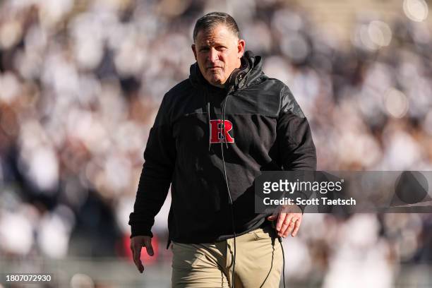 Head coach Greg Schiano of the Rutgers Scarlet Knights reacts to a play against the Penn State Nittany Lions during the second half at Beaver Stadium...