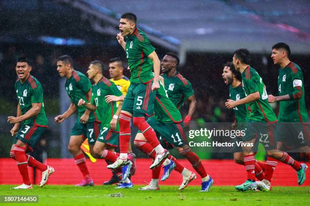 Players of Mexico celebrate the victory against Honduras during the CONCACAF Nations League quarterfinals second leg match between Mexico and...