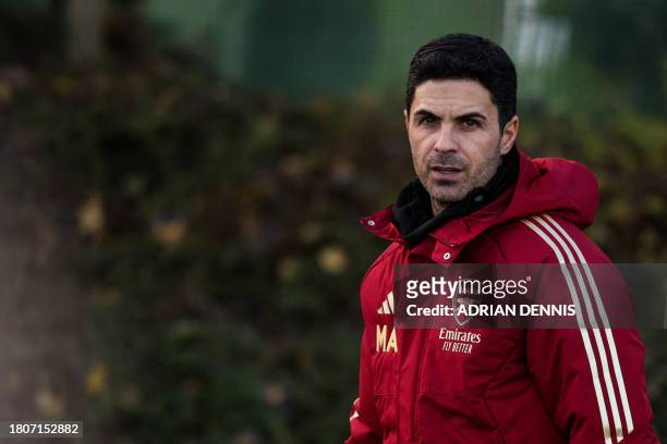 Arsenal's Spanish manager Mikel Arteta reacts as he attends a team training session at Arsenal's training ground in north London, on November 28 on...