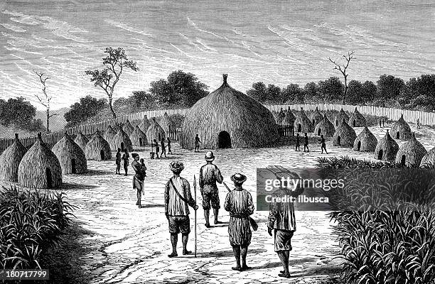 chief hut in african village - african village stock illustrations