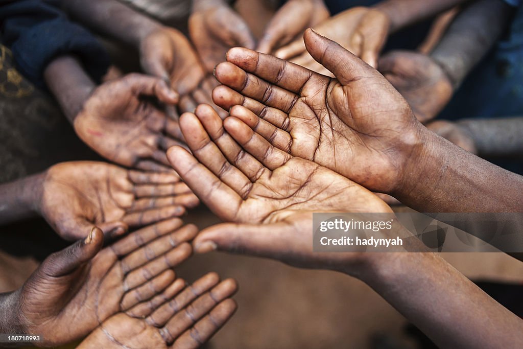 Hands of poor - asking for help, Africa