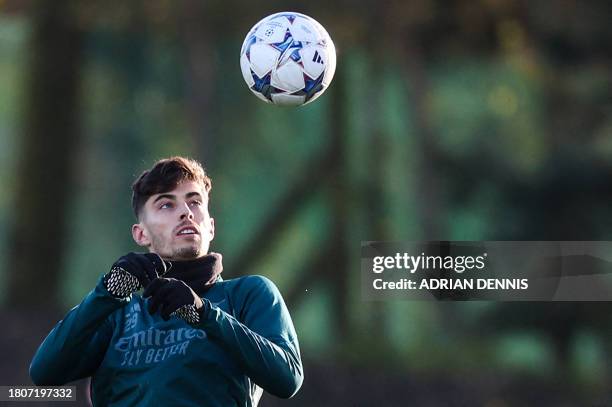 Arsenal's German midfielder Kai Havertz attends a team training session at Arsenal's training ground in north London, on November 28 on the eve of...