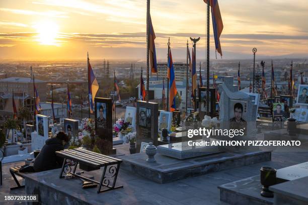 Yerevan, Armenia. Citizens visit their loved ones at Yerablur Military Cemetery who were killed recently during September in Nagorno-Karabakh. Family...