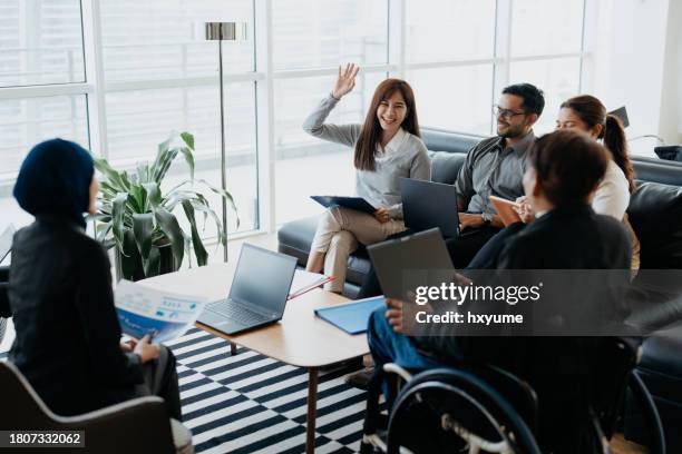 multiracial business team meeting in office - malay people stock pictures, royalty-free photos & images