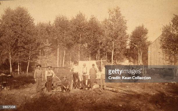 Group of members of the Ku Klux Klan pose at their 'Petite Bostonais' campsite, August 1893.