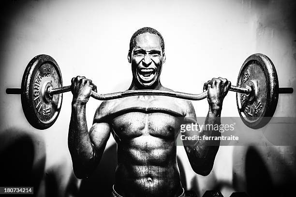 weight lifting - strongman stock pictures, royalty-free photos & images