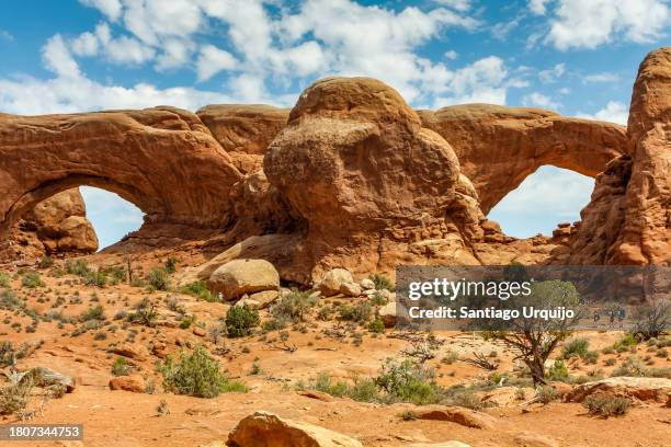 north and south windows at arches national park - southern utah stock pictures, royalty-free photos & images