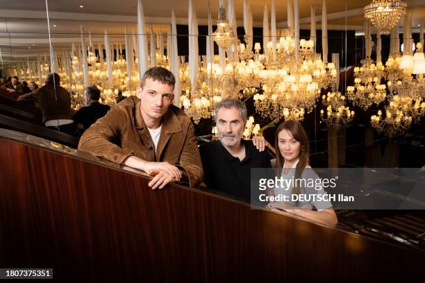 The actors Niels Schneider, Olga Kurylenko and Xavier Giannoli are photographed for Paris Match at the Hotel Royal Monceau on September 20, 2023.