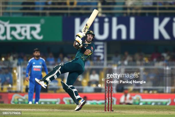 Glenn Maxwell of Australia plays a shot during game three of the T20 International Series between India and Australia at Barsapara Cricket Ground on...