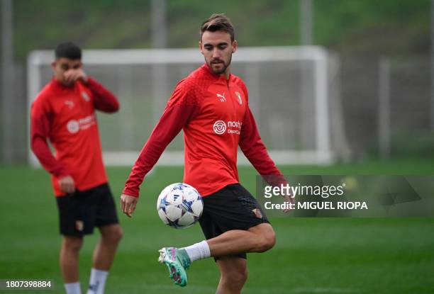 Sporting Braga's Portuguese midfielder Andre Horta attends a training session at the SC Braga Sport City in Braga on November 28, 2023 on the eve of...