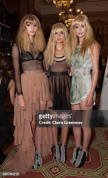 Models pose backstage at the Kristian Aadnevik show during London Fashion Week SS14 at The Royal Horseguards on September 15, 2013 in London, England.
