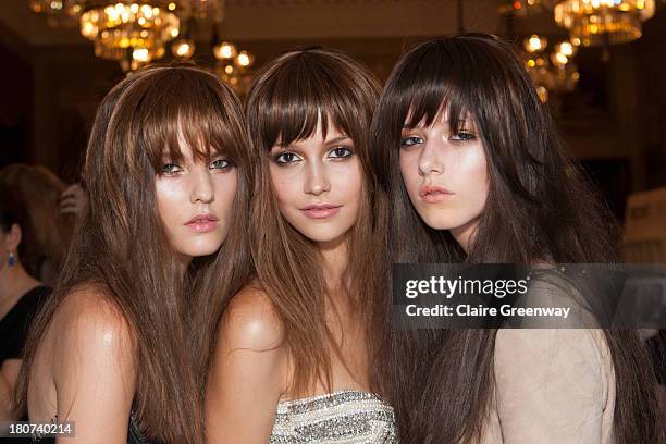 Models pose backstage wearing Frontcover Cosmetics at the Kristian Aadnevik show during London Fashion Week SS14 at The Royal Horseguards on...