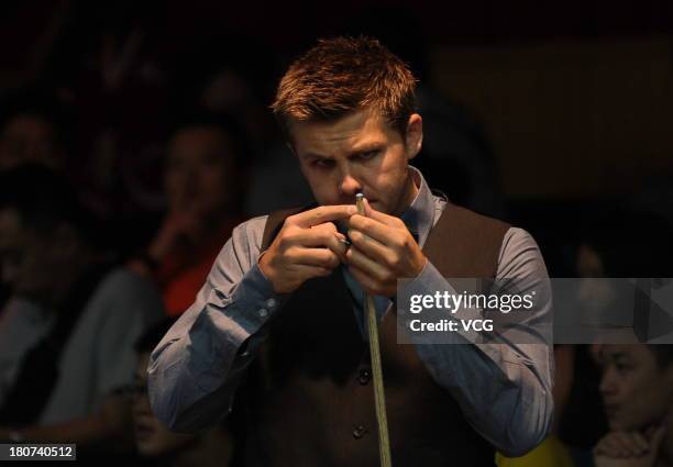 Ryan Day of Wales looks on in the match against Lu Ning of China on day 1 of the 2013 World Snooker Shanghai Masters at Shanghai Grand Stage on...