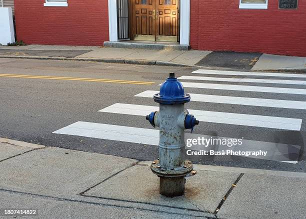 colorful fire hydrant in street of boston - fire hydrant stock pictures, royalty-free photos & images