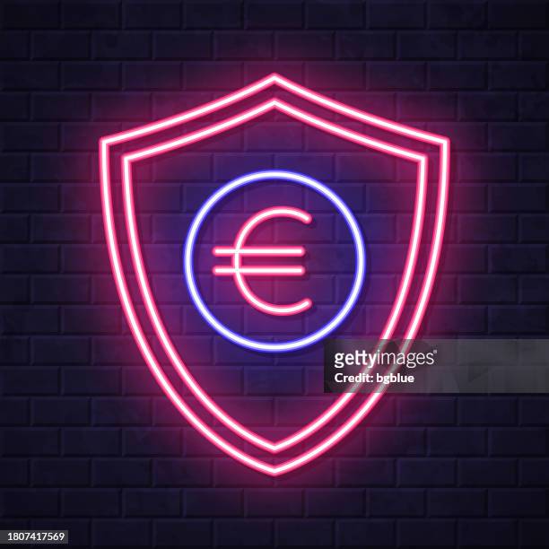 shield with euro. glowing neon icon on brick wall background - wall e stock illustrations
