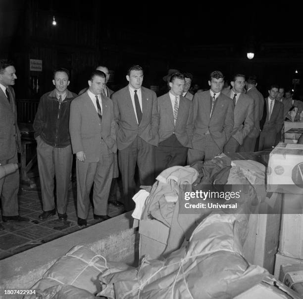 Hungarian soccer player Ferenc Puskas with Hungarian footballers visiting the rescue center for the Hungary, November 12, 1956 in Paris.