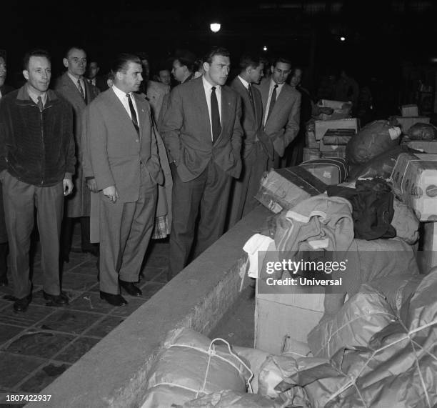 Hungarian soccer player Ferenc Puskas with Hungarian footballers visiting the rescue center for the Hungary, November 12, 1956 in Paris.