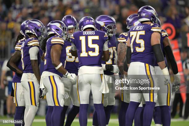 Minnesota Vikings quarterback Joshua Dobbs calls a play in the huddle during an NFL game between the Minnesota Vikings and Chicago Bears on November...