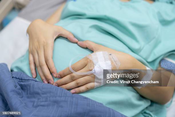 woman is waiting to give birth at hospital - obstetric forceps stock pictures, royalty-free photos & images
