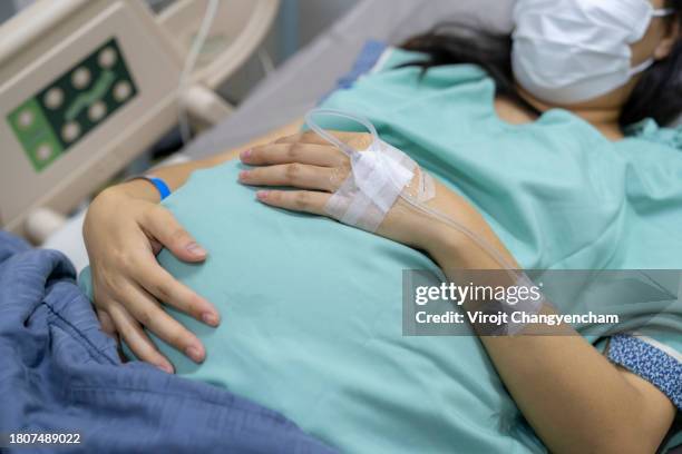 woman is waiting to give birth at hospital - obstetric forceps stock pictures, royalty-free photos & images