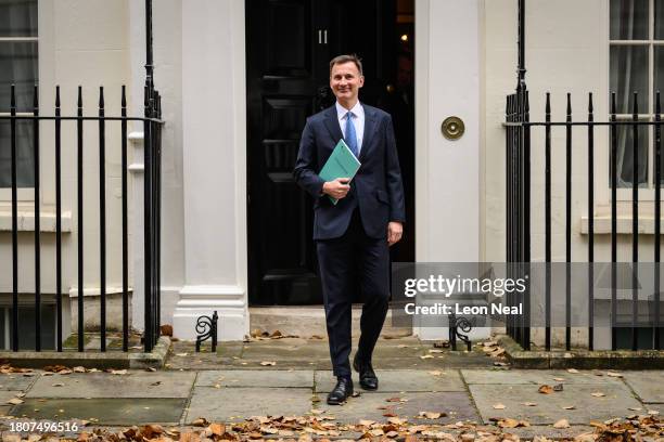 Chancellor of the Exchequer Jeremy Hunt leaves number 11 Downing Street on November 22, 2023 in London, England. Jeremy Hunt aims to present a...