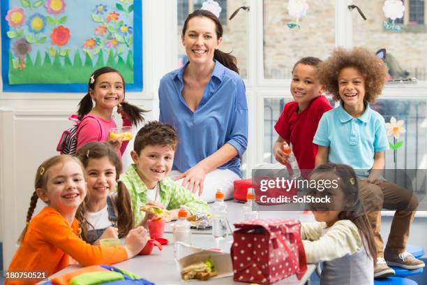 young students at lunchtime - boy packlunch stockfoto's en -beelden