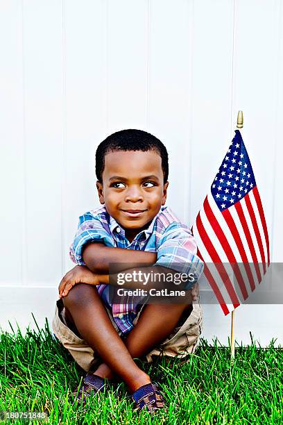 patriotic little boy - child saluting stock pictures, royalty-free photos & images