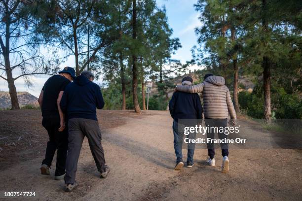 Los Angeles, CA - Pete Teti, second from right, turns 100 years old this week. Pete is hiking with his buddies in Griffith Park early in the morning...