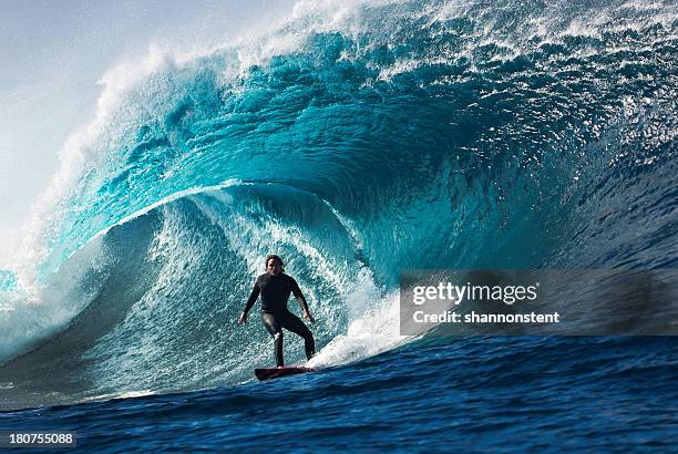 large wave with surfer in tunnel wave - surfing stock pictures, royalty-free photos & images