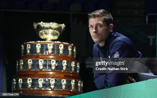 Neal Skupski of Great Britain look on as they takes part in a training session prior to the Davis Cup final at Palacio de Deportes Jose Maria Martin...