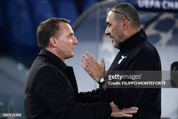 Lazio's Italian headcoach Maurizio Sarri and Celtic's Northern Ireland coach Brendan Rodgers greet each other before the UEFA Champions League Group...