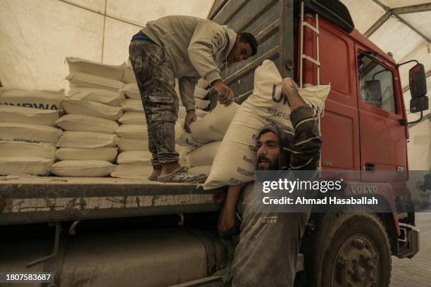 Distributes flour to Palestinian refugees on November 22, 2023 in Khan Yunis, Gaza. On Tuesday night, Israel and Hamas agreed to a four-day pause in...