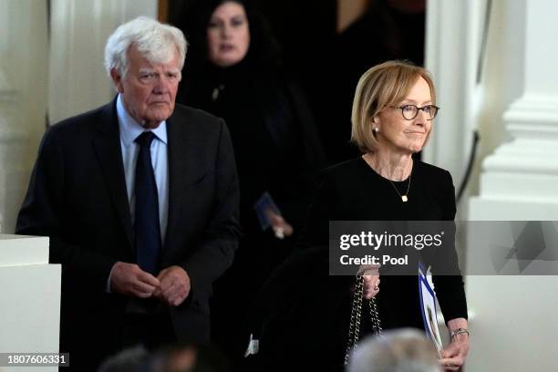 Judy Woodruff of PBS NewsHour and her husband Al Hunt arrive for a tribute service for former first lady Rosalynn Carter at Glenn Memorial Church at...